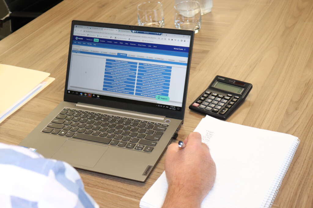 finance broker on a computer